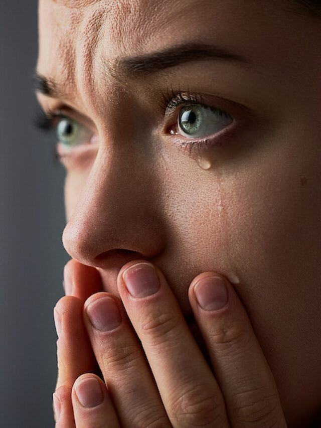 Sad,Desperate,Grieving,Crying,Woman,With,Folded,Hands,And,Tears