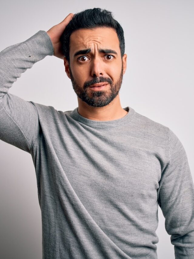 Young,Handsome,Man,With,Beard,Wearing,Casual,Sweater,Standing,Over