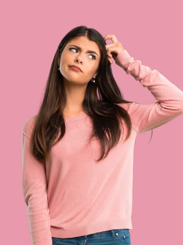 Teenager,Girl,With,Pink,Shirt,Having,Doubts,While,Scratching,Head