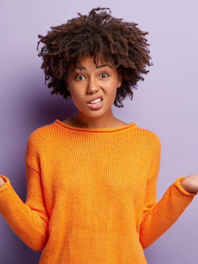 Isolated,Shot,Of,Confused,Beautiful,Woman,With,Dark,Skin,,Curly