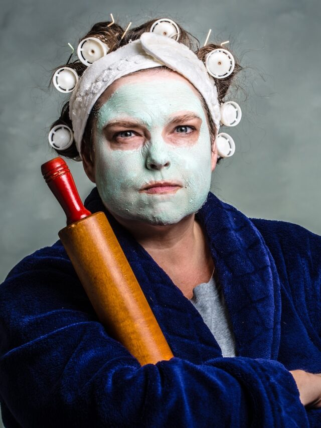 Mean,And,Ugly,Housewife,With,Facial,Mask,,Hair,Rollers,And